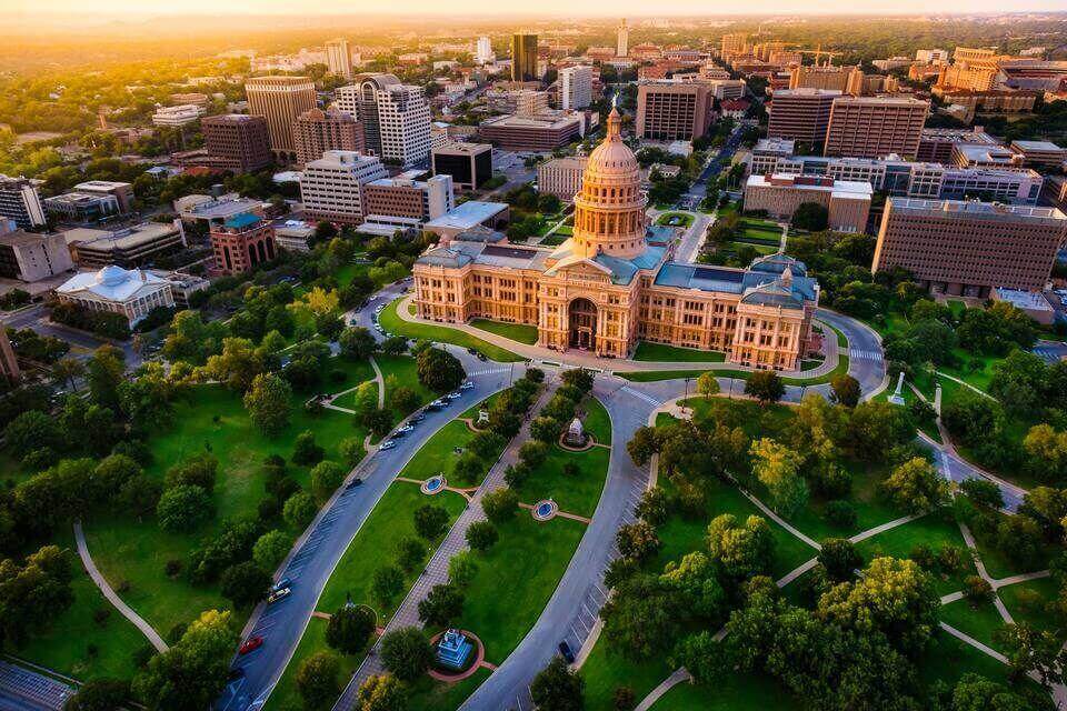 Aerial view of Texas State Capitol building and surrounding buildings