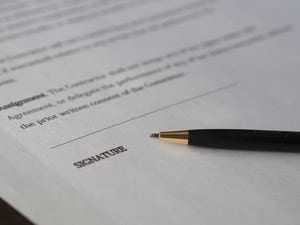 unsigned contract and pen
