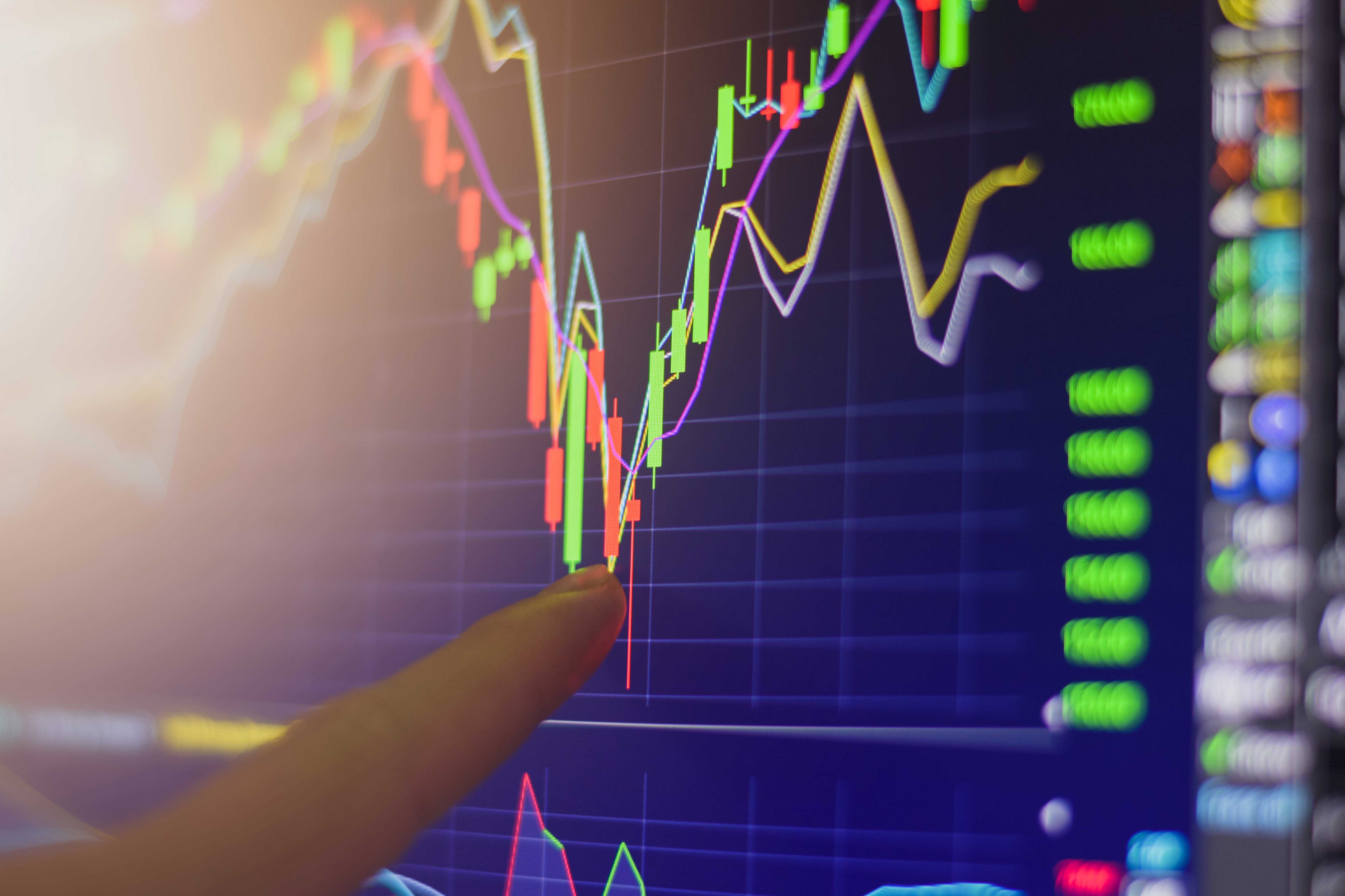 finger-pointing-stock-exchange-market-chart-investment-trading